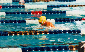 Woman swimming in a lap lane of a pool